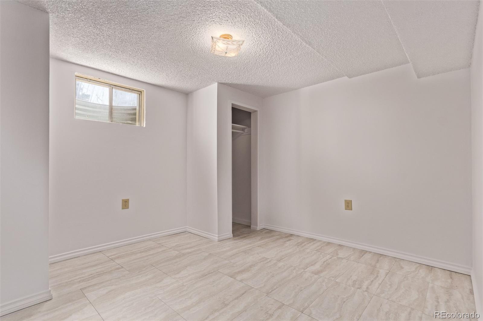 7720 Kendall Street Arvada, CO 80003 - Photo 25 of 45 wooden floor in an empty room