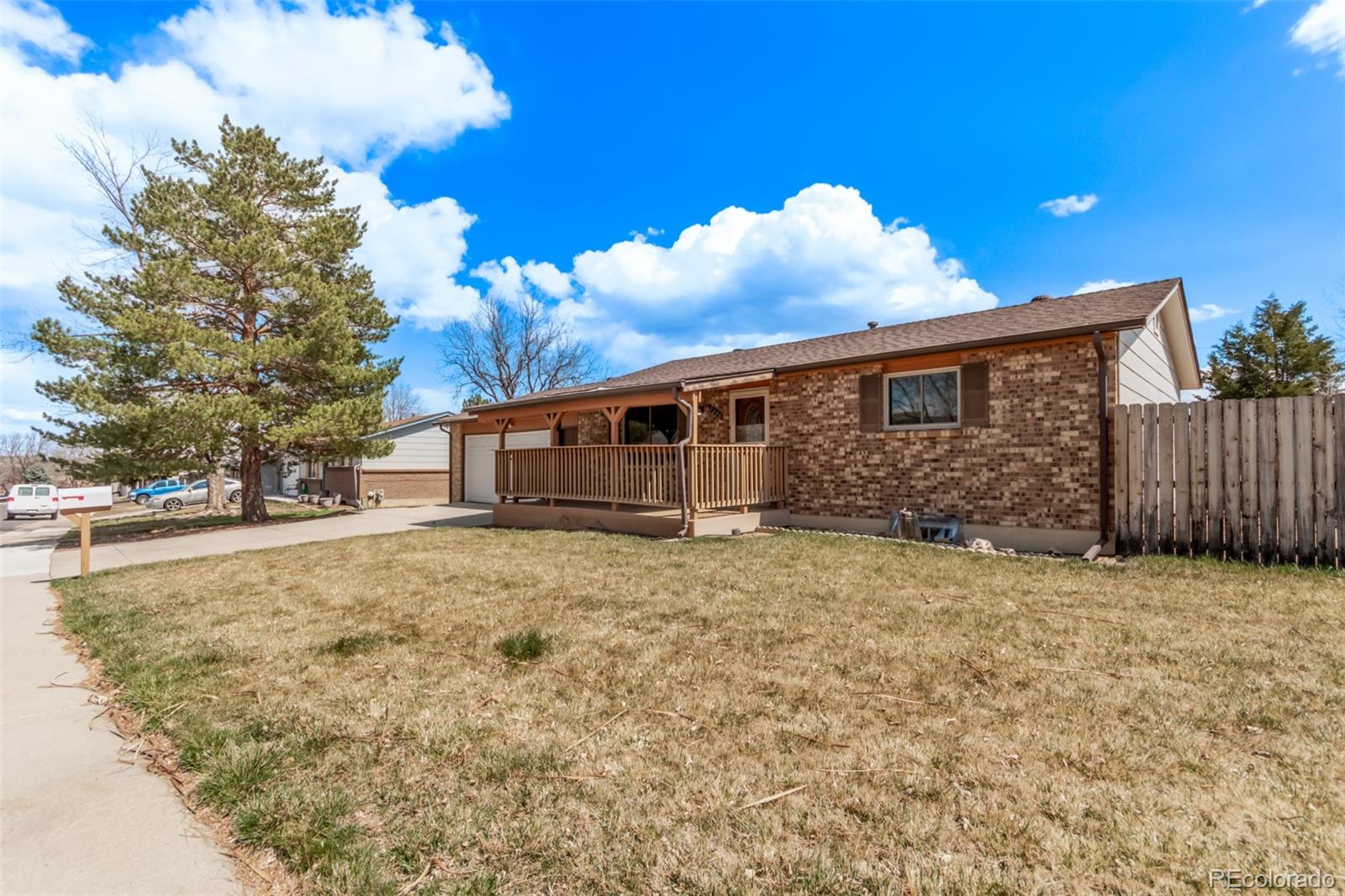 7720 Kendall Street Arvada, CO 80003 - Photo 38 of 45 a view of a house with a yard