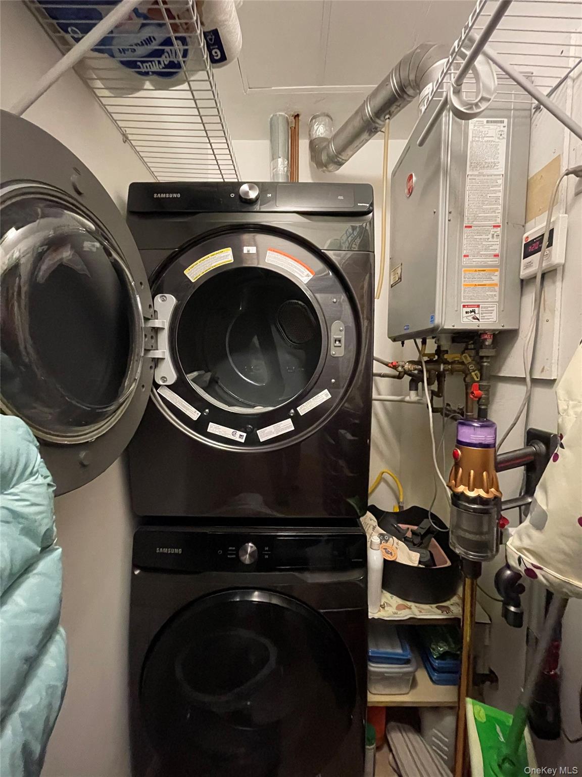 350 Soundview Lane Queens, NY 11356 - Photo 11 of 11 a utility room with dryer and washer