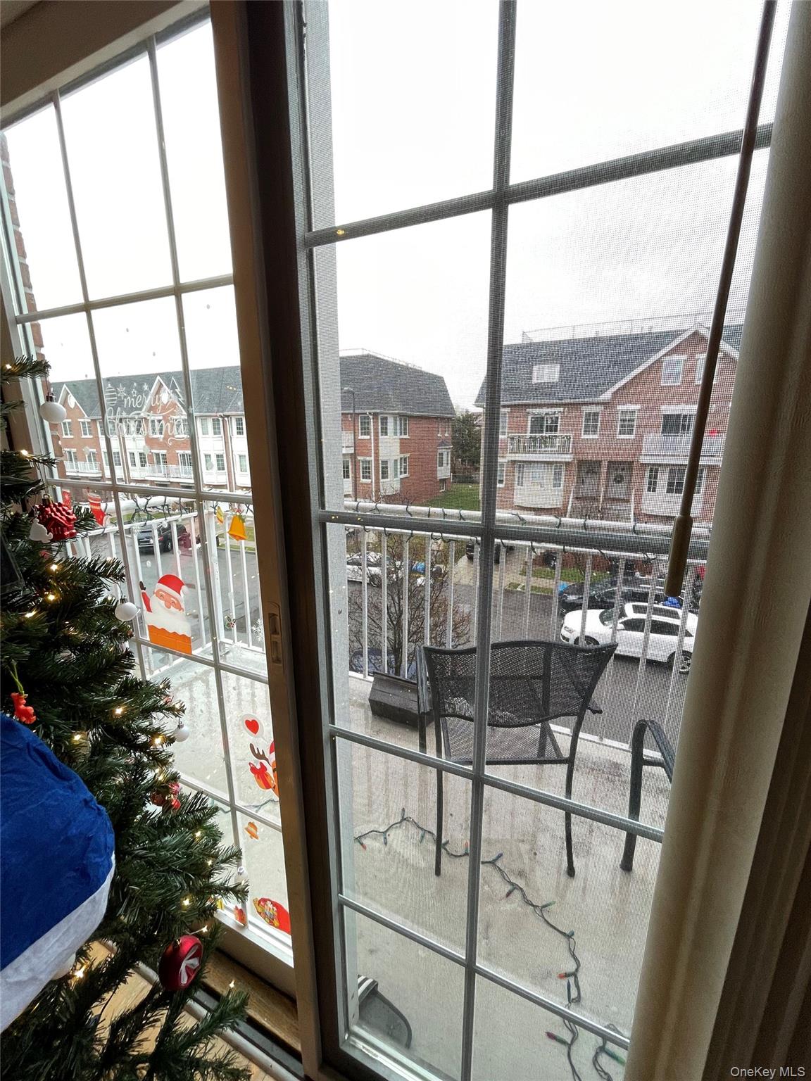 350 Soundview Lane Queens, NY 11356 - Photo 10 of 11 a view of a balcony with a potted plant
