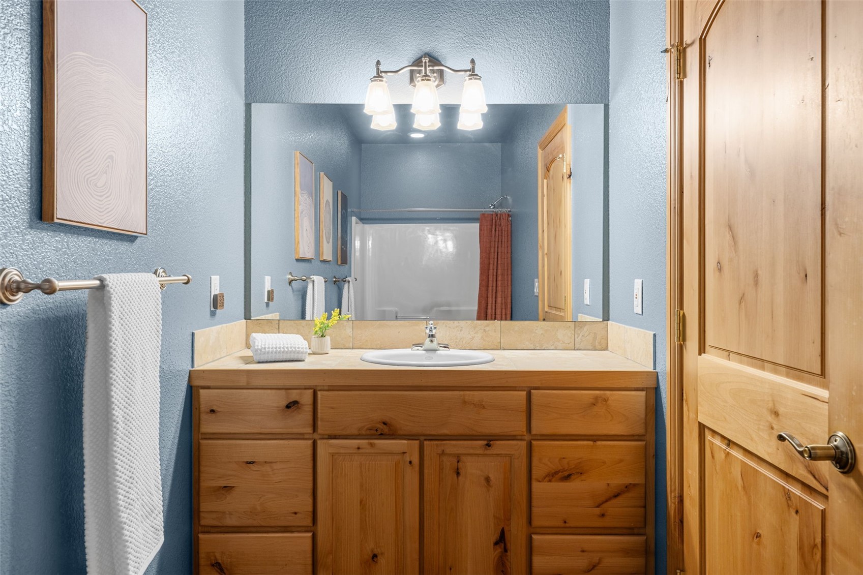 91795 Ryan Gulch Road Silverthorne, CO 80498 - Photo 44 of 50 a bathroom with a sink and a mirror
