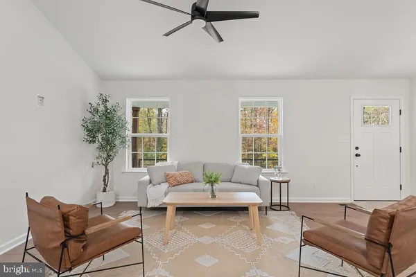 a living room with furniture and window