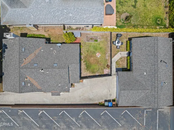 an aerial view of a building with outdoor space