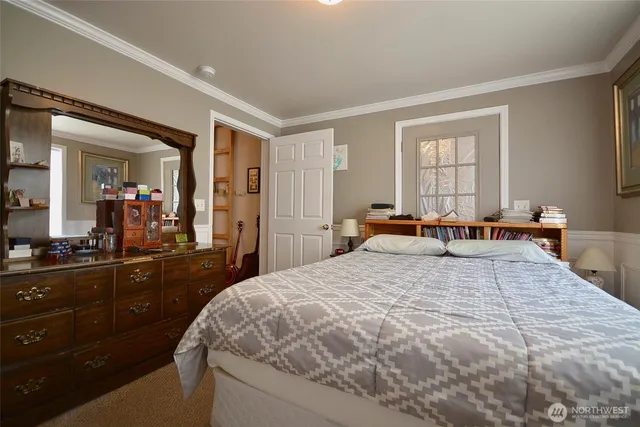 a bathroom with a sink a mirror and a toilet