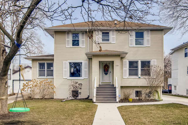 126 Southcote Road Riverside, IL 60546 - Photo 1 of 31 a front view of a house with a yard
