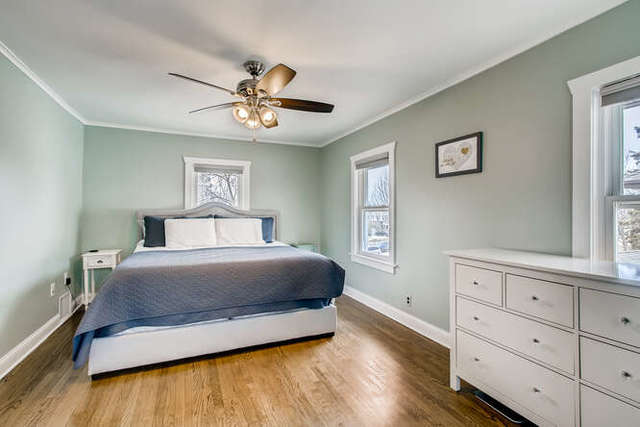 126 Southcote Road Riverside, IL 60546 - Photo 14 of 31 a bedroom with a bed and window with cabinet