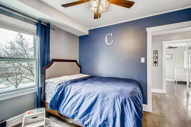 126 Southcote Road Riverside, IL 60546 - Photo 16 of 31 a bedroom with a bed and wooden floor