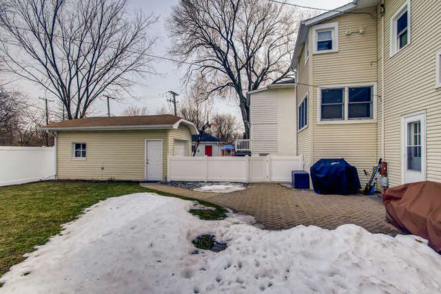 126 Southcote Road Riverside, IL 60546 - Photo 26 of 31 a front view of a house with a yard and garage