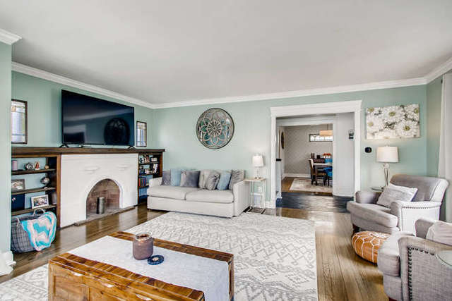 126 Southcote Road Riverside, IL 60546 - Photo 6 of 31 a living room with fireplace furniture and a flat screen tv