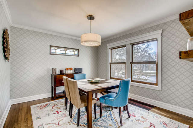 126 Southcote Road Riverside, IL 60546 - Photo 7 of 31 a view of a dining room with furniture window and wooden floor