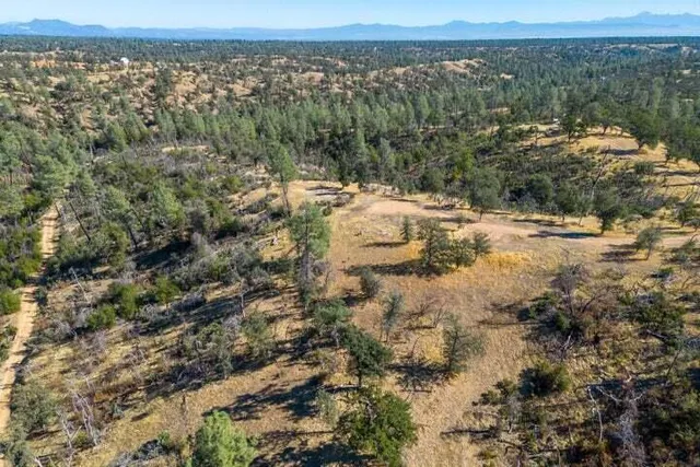 a view of a city with mountain