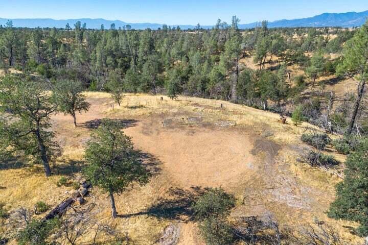 Coal Pit Road Anderson, CA 96007 - Photo 8 of 26 a view of a lake with a mountain in the background