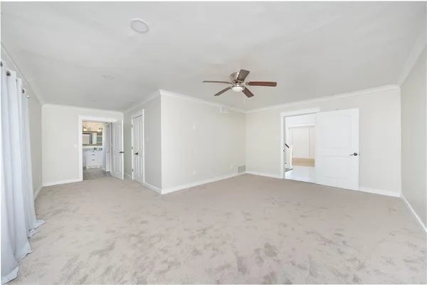 a bathroom with a shower and a sink