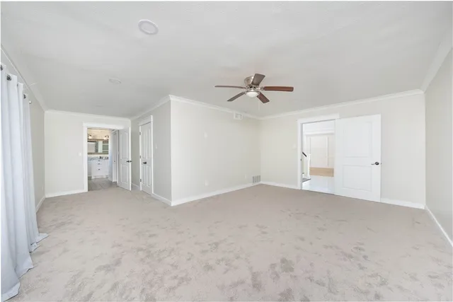 a bathroom with a shower and a sink