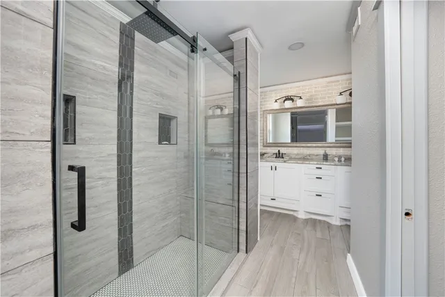 a bathroom with a sink and a mirror