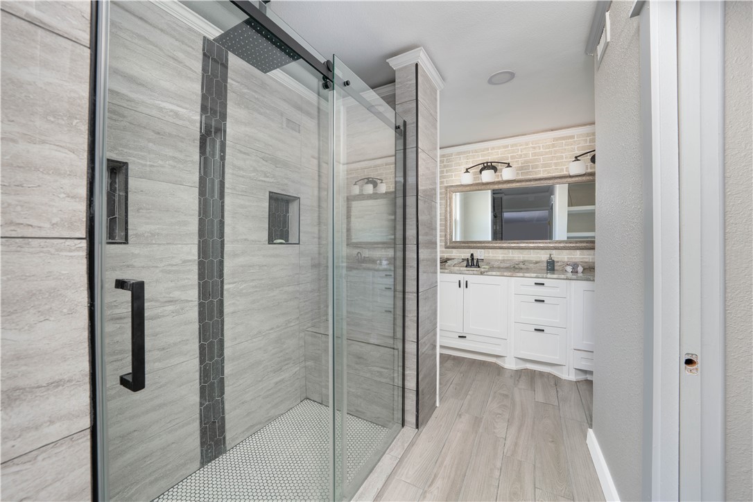 6402 Clearlake Circle Corpus Christi, TX 78413 - Photo 18 of 29 a bathroom with a shower and a sink