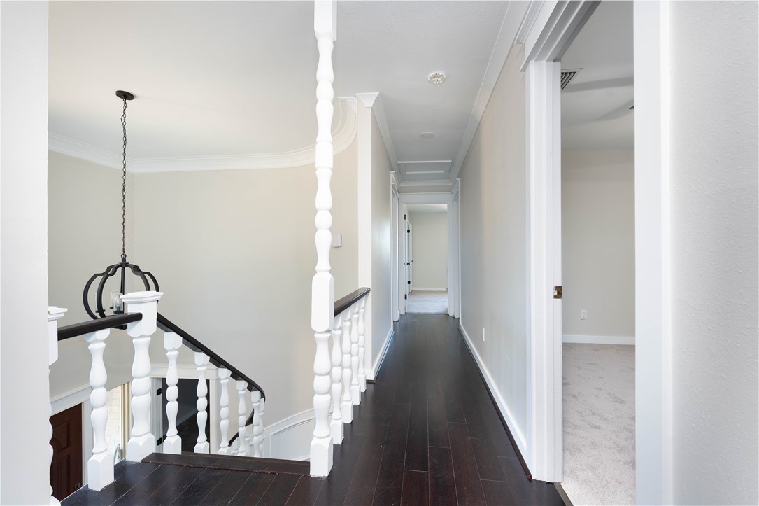 6402 Clearlake Circle Corpus Christi, TX 78413 - Photo 20 of 29 a view of a hallway with windows and stairs