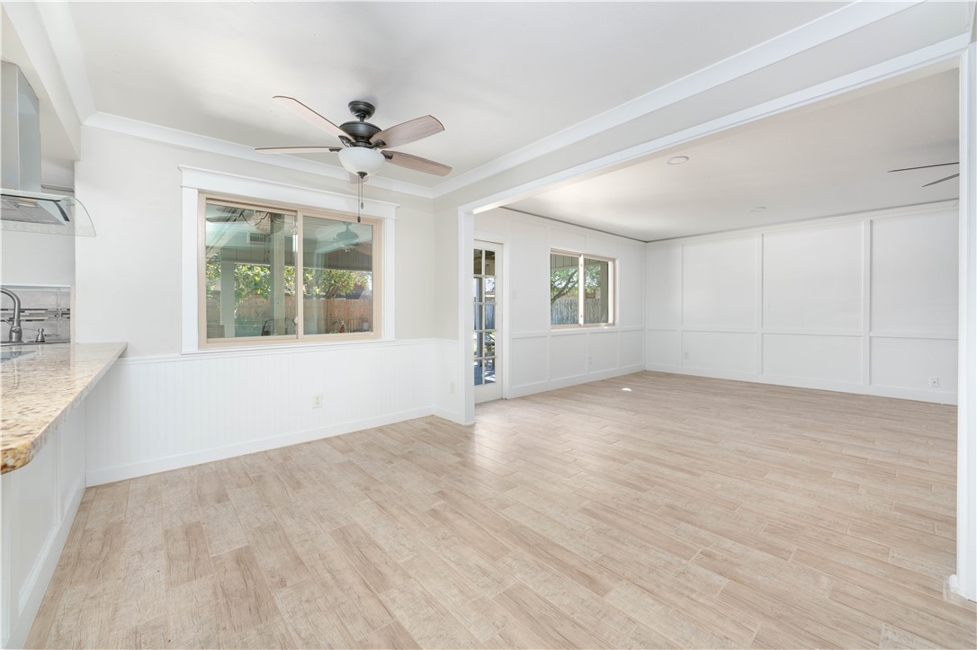 6402 Clearlake Circle Corpus Christi, TX 78413 - Photo 10 of 29 a view of empty room with wooden floor and fan