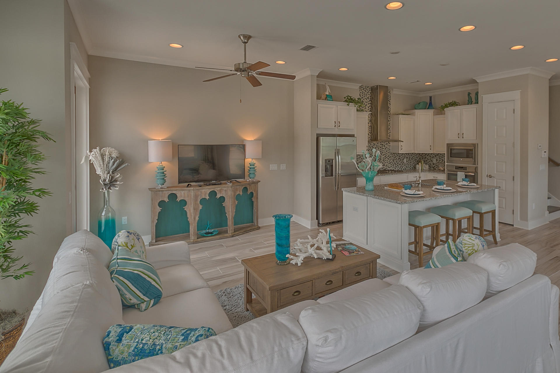 99 Pine Lands Loop Inlet Beach East, Unit A Inlet Beach, FL 32461 - Photo 2 of 30 a living room with furniture and a view of kitchen
