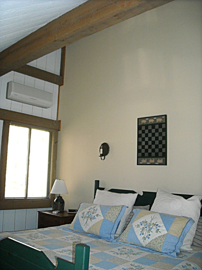 210 Hupi Road Monterey, MA 01245 - Photo 17 of 39 a bed room with a bed and a window