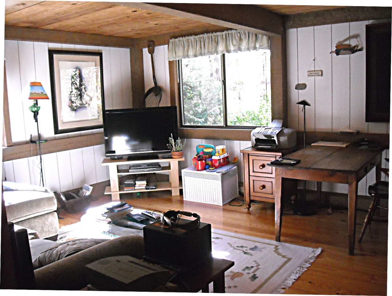 210 Hupi Road Monterey, MA 01245 - Photo 19 of 39 a living room with furniture a flat screen tv and a window