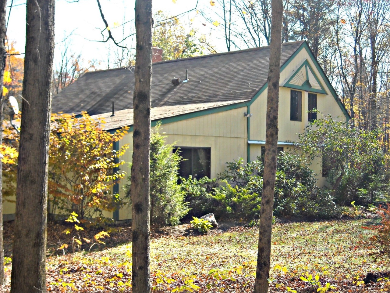 210 Hupi Road Monterey, MA 01245 - Photo 25 of 39 front view of a house with a yard