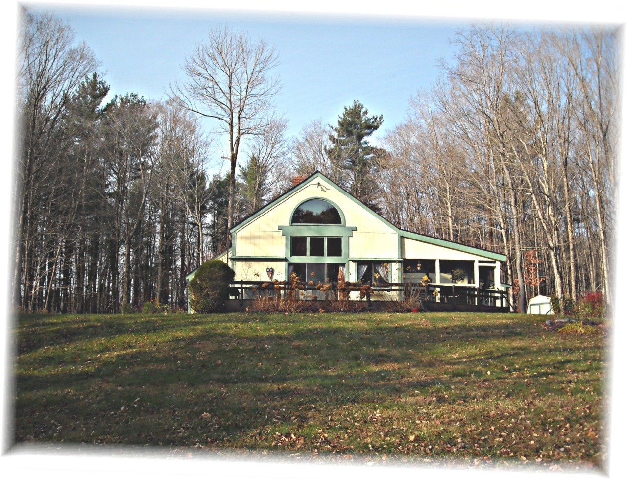 210 Hupi Road Monterey, MA 01245 - Photo 36 of 39 a front view of a house with a yard