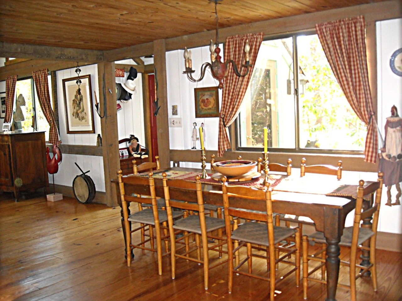 210 Hupi Road Monterey, MA 01245 - Photo 7 of 39 a view of a dining room with furniture and windows