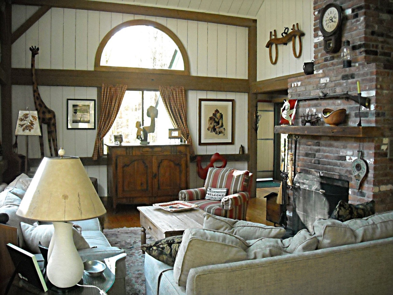 210 Hupi Road Monterey, MA 01245 - Photo 9 of 39 a living room with furniture and a fireplace