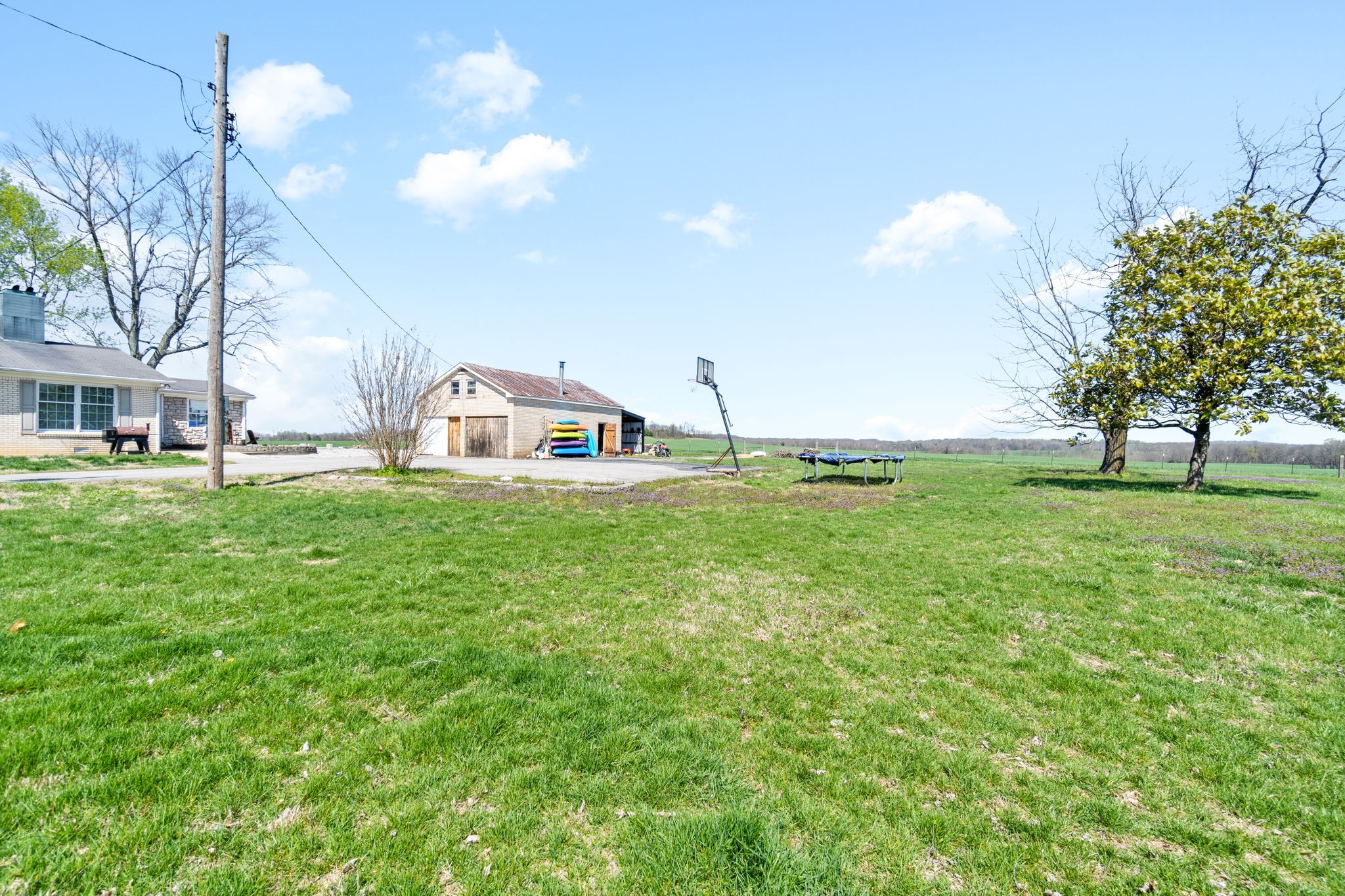 5150 Cadiz Road Hopkinsville, KY 42240 - Photo 43 of 45 a view of a house with a backyard