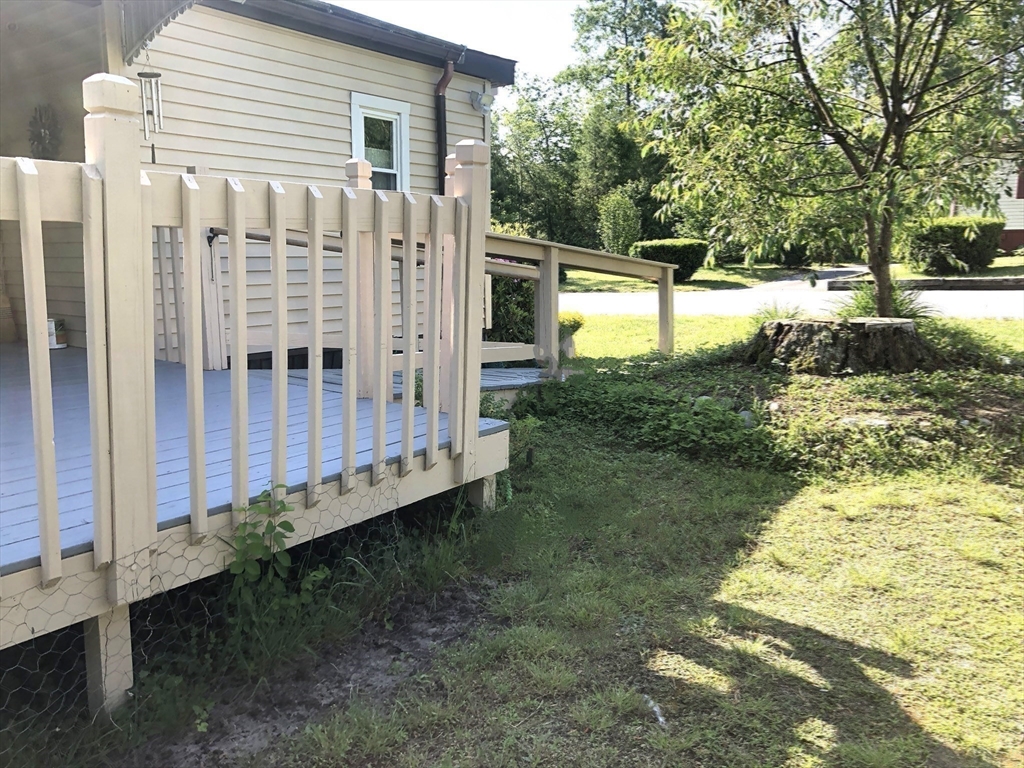 41 Pipers Way Carver, MA 02330 - Photo 30 of 36 a view of a small yard with wooden fence