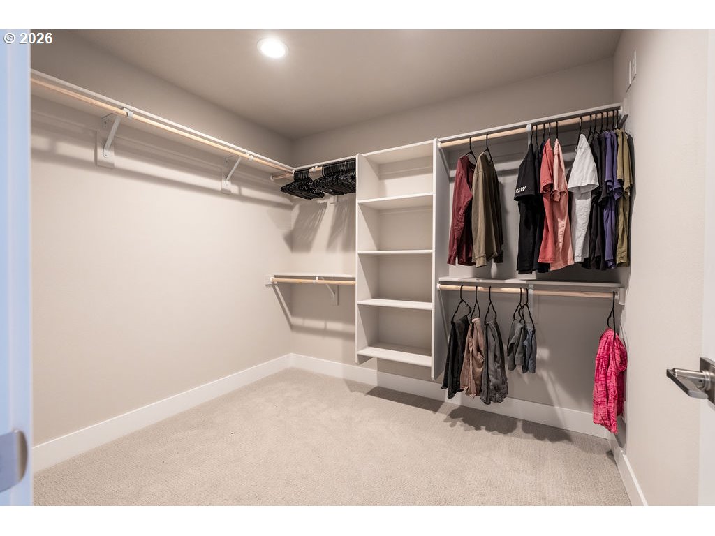 9149 North Hargrave Street Camas, WA 98607 - Photo 17 of 36 a view of walk in closet with clothes