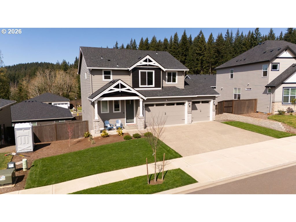 9149 North Hargrave Street Camas, WA 98607 - Photo 2 of 36 a front view of a house with a yard