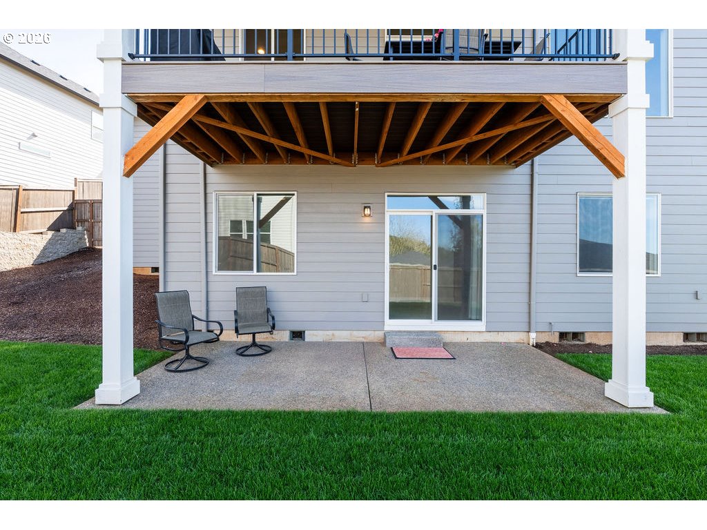 9149 North Hargrave Street Camas, WA 98607 - Photo 29 of 36 a view of backyard of house with deck and seating space