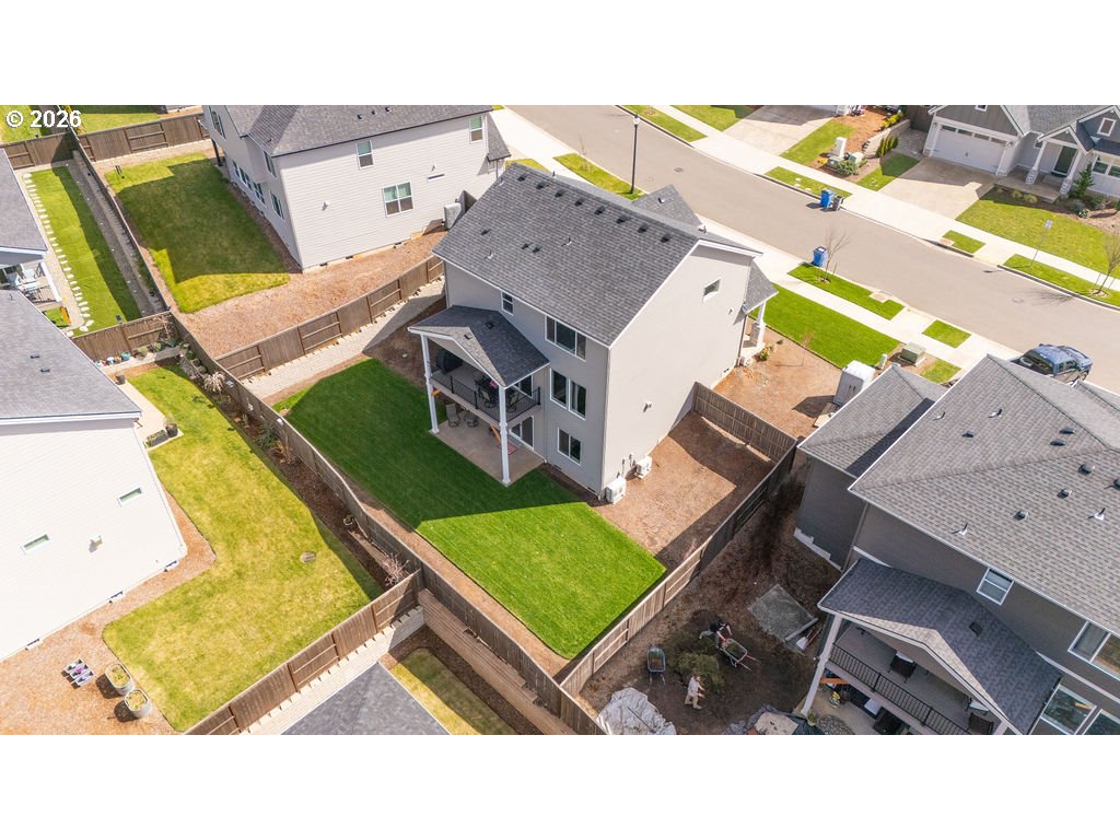 9149 North Hargrave Street Camas, WA 98607 - Photo 32 of 36 an aerial view of a house with a garden