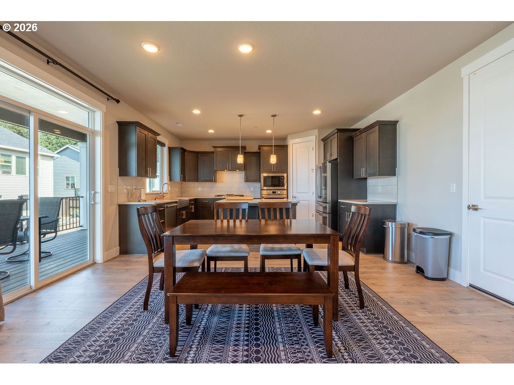 9149 North Hargrave Street Camas, WA 98607 - Photo 6 of 36 a view of a dining room with furniture