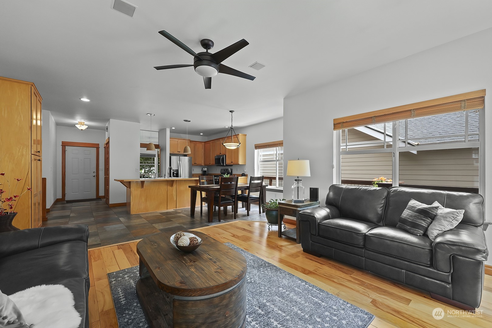18564 Rainier View Road Southeast Monroe, WA 98272 - Photo 12 of 34 a living room with furniture and a large window