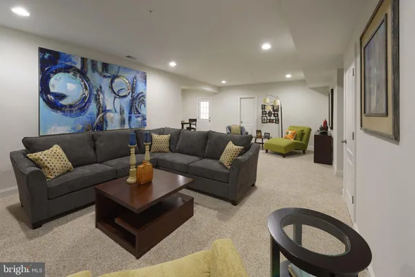 a living room with furniture and a couch