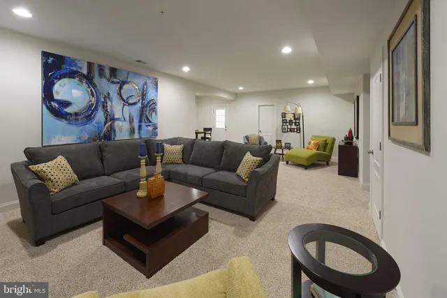 a living room with furniture and a couch