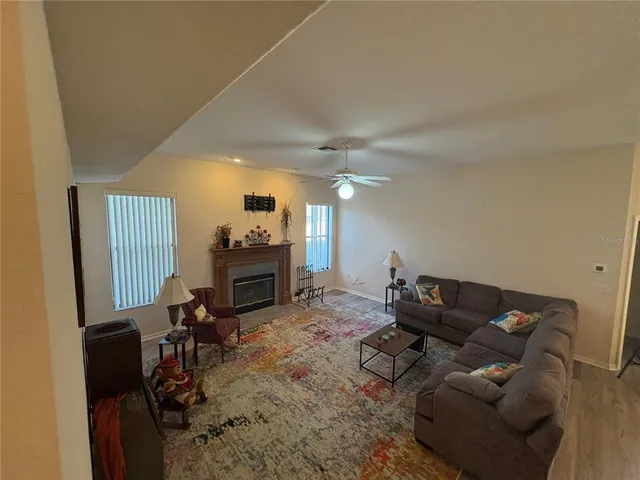 a room with furniture and wooden floor