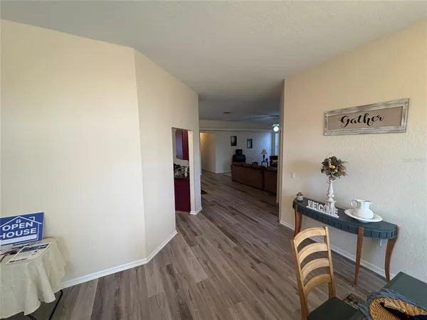 a room with furniture and wooden floor