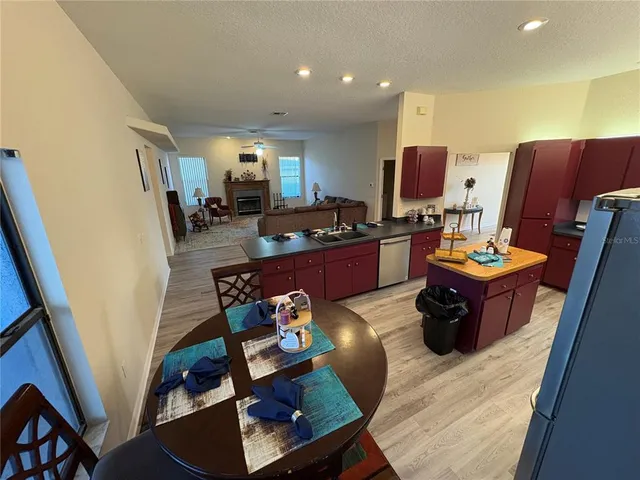 a view of an empty room with a floor to ceiling window