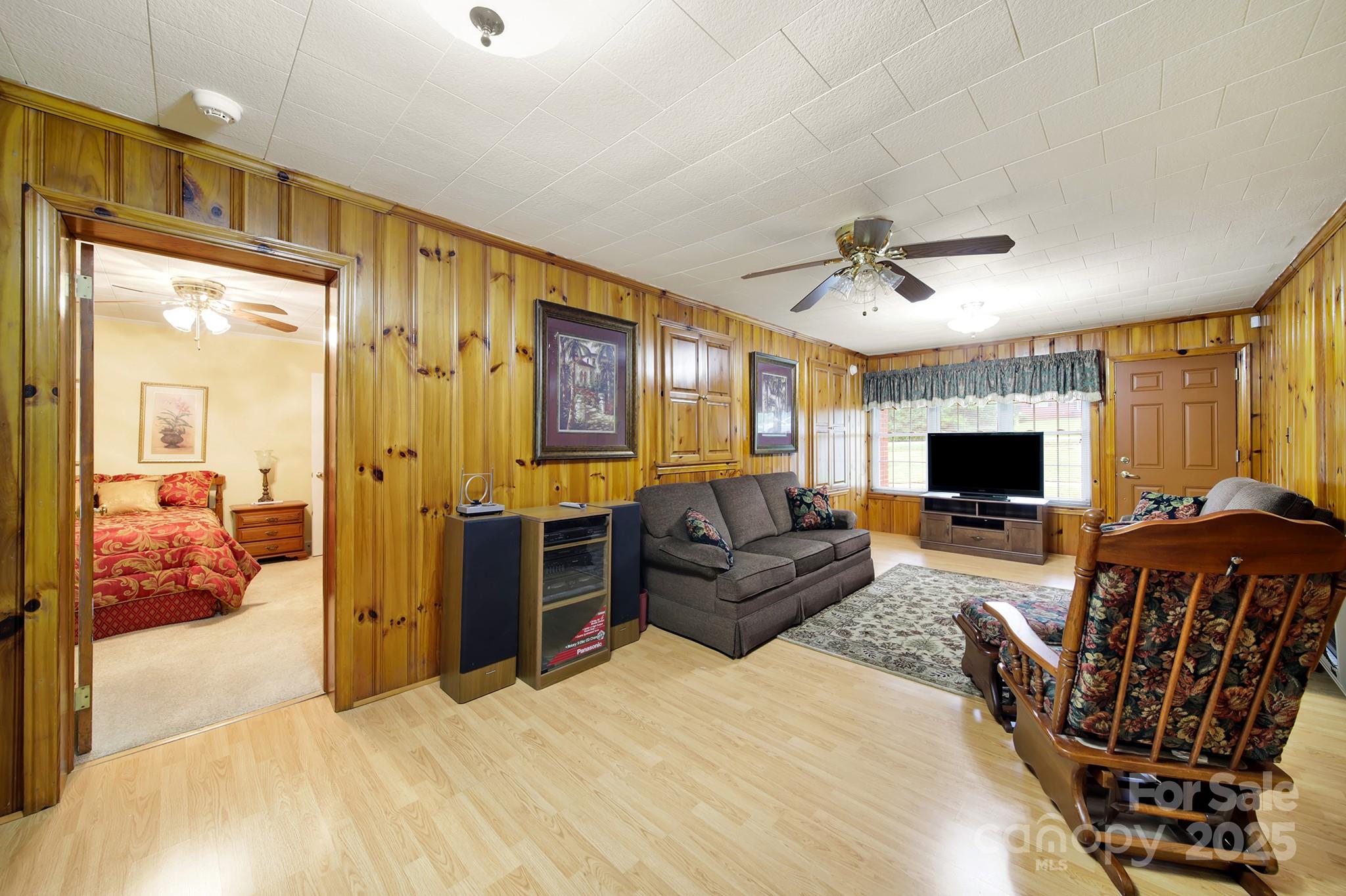 4462 Flat Creek Road Lancaster, SC 29720 - Photo 22 of 35 a bedroom with furniture and a flat screen tv