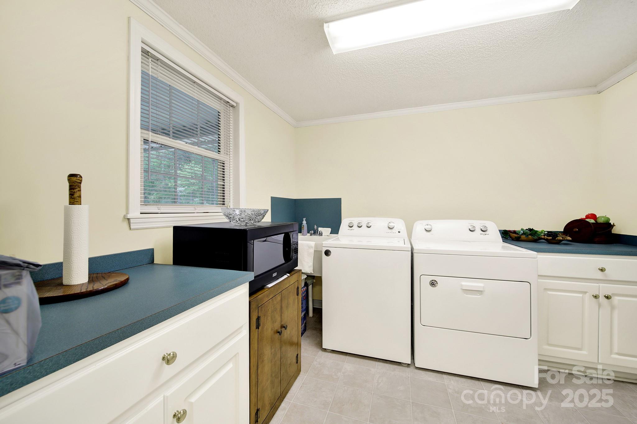 4462 Flat Creek Road Lancaster, SC 29720 - Photo 23 of 35 a utility room with dryer and washer
