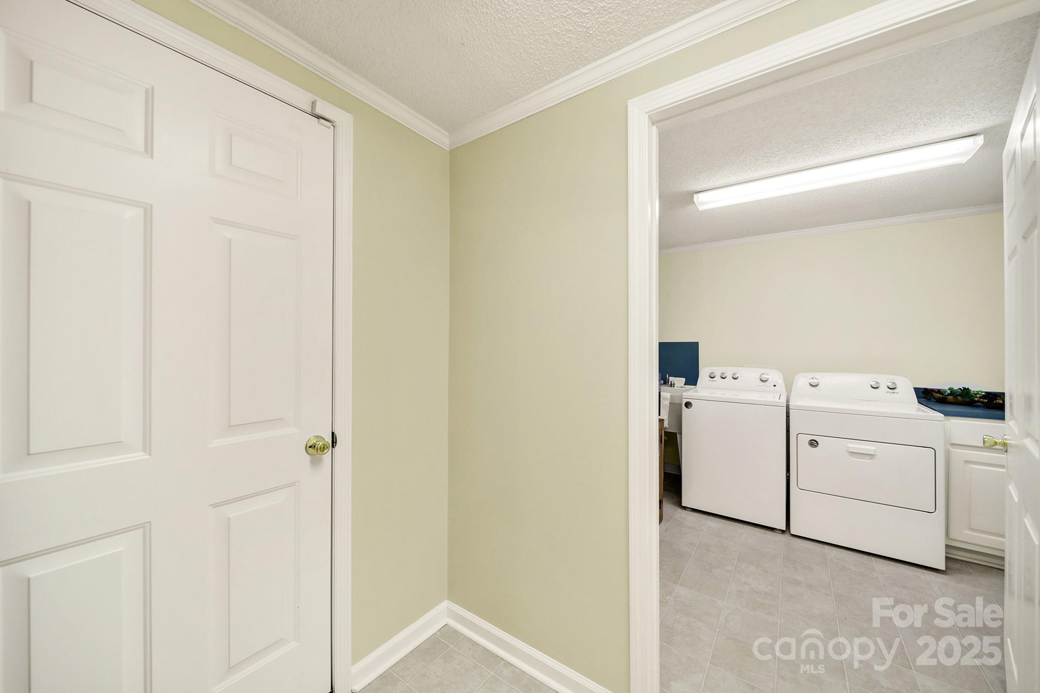 4462 Flat Creek Road Lancaster, SC 29720 - Photo 24 of 35 a utility room with dryer and washer