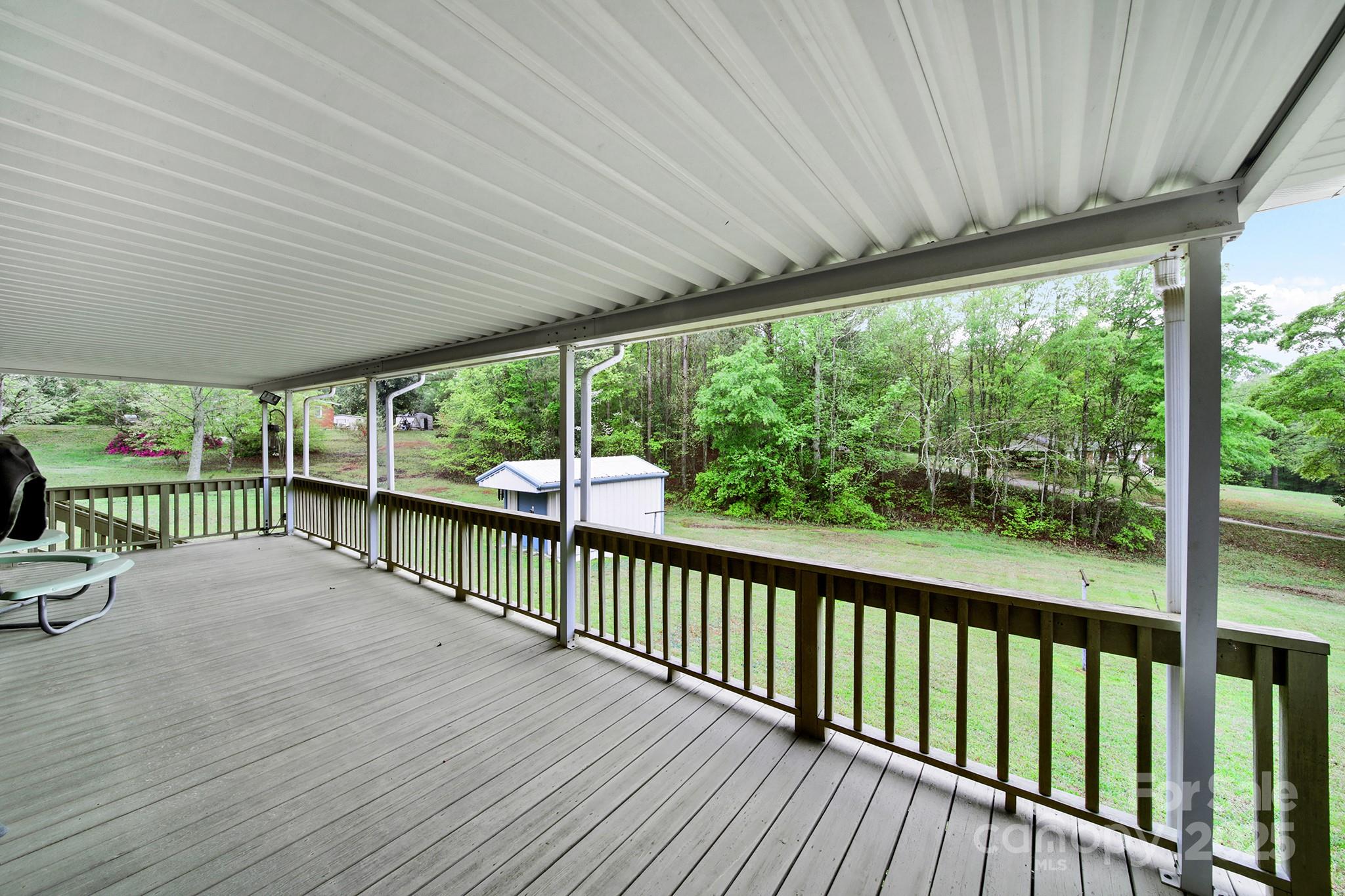 4462 Flat Creek Road Lancaster, SC 29720 - Photo 25 of 35 a view of porch with a floor to ceiling window