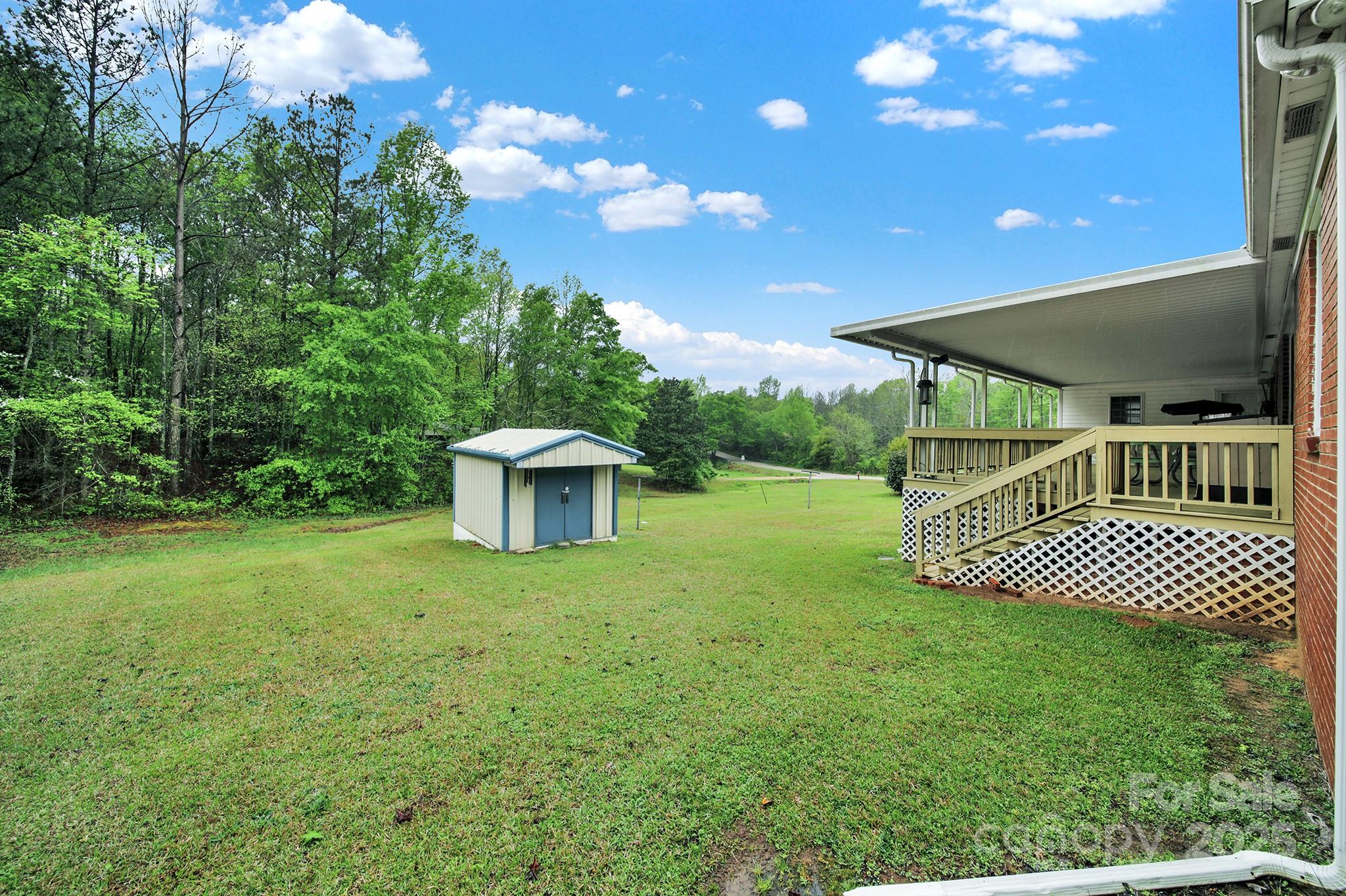 4462 Flat Creek Road Lancaster, SC 29720 - Photo 27 of 35 a front view of a house with garden