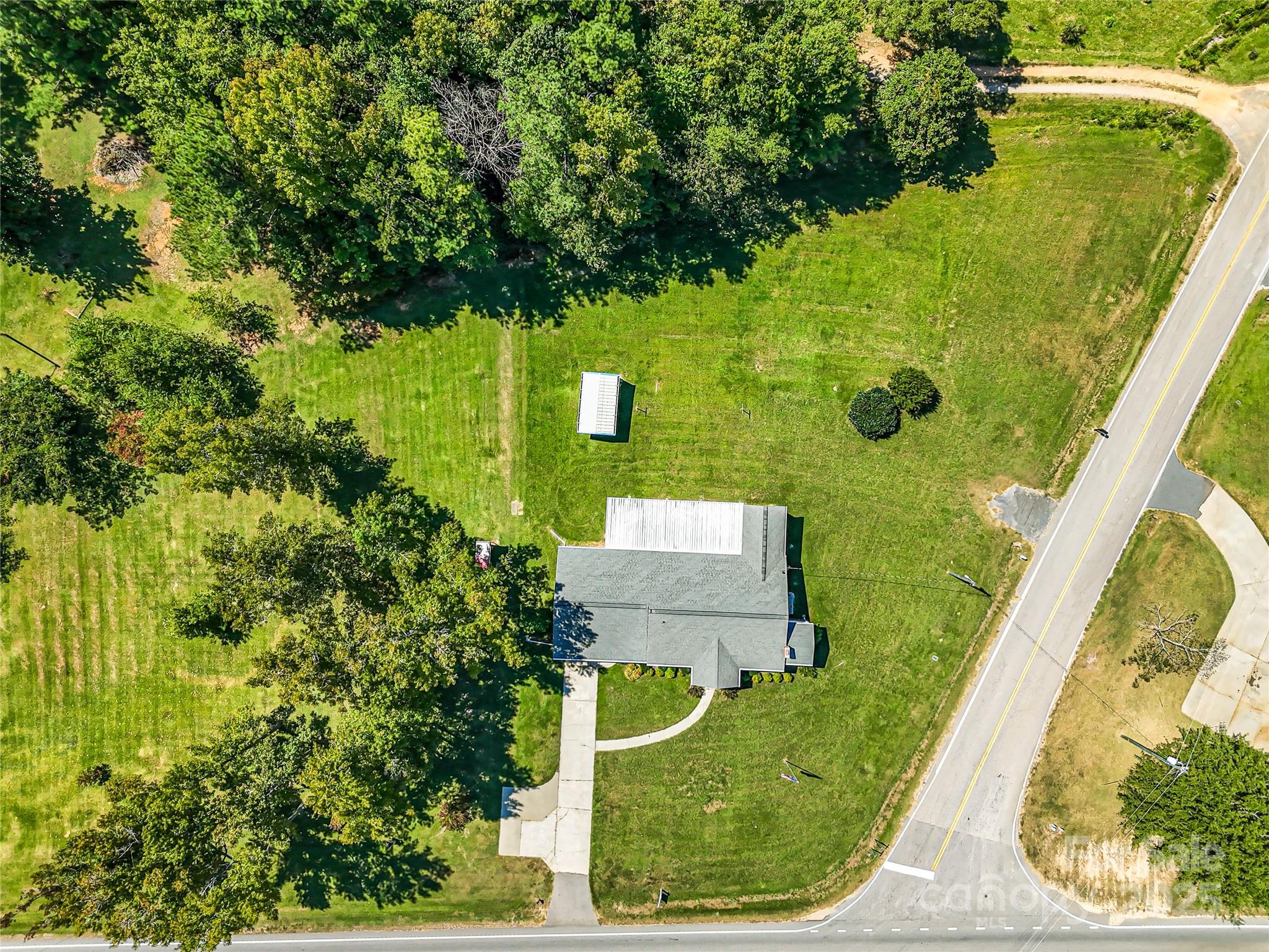4462 Flat Creek Road Lancaster, SC 29720 - Photo 29 of 35 an aerial view of a residential houses with yard
