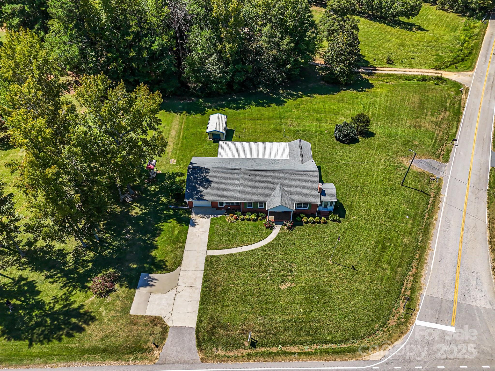 4462 Flat Creek Road Lancaster, SC 29720 - Photo 30 of 35 an aerial view of a house with a yard basket ball court and outdoor seating