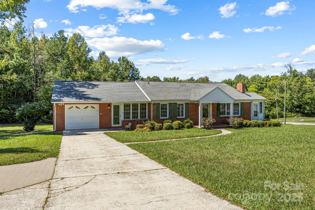 4462 Flat Creek Road Lancaster, SC 29720 - Photo 3 of 35 a front view of houses with yard and green space